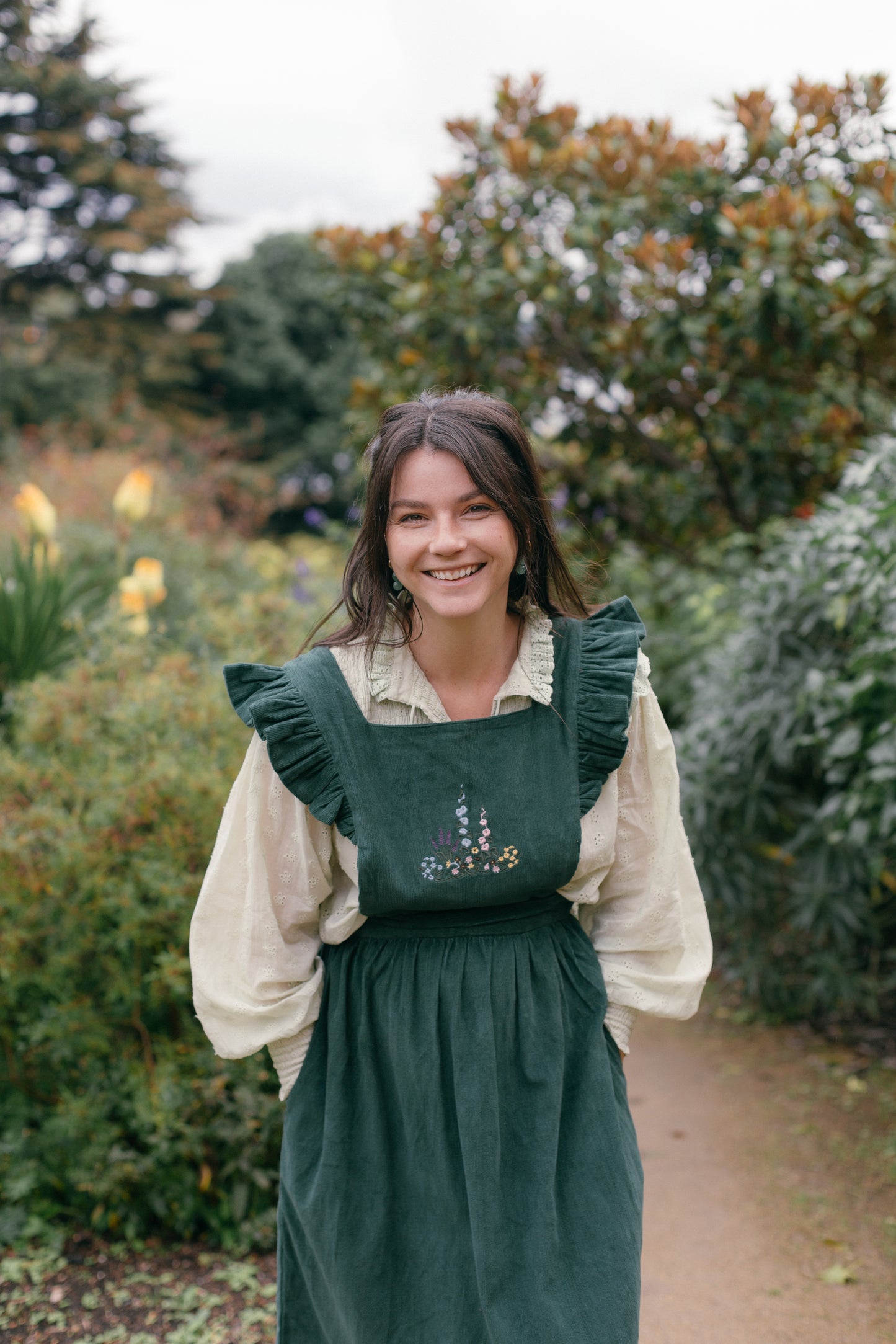 100% RECYCLED COTTON - ANOUK RUFFLE PINAFORE/SKIRT CORDUROY FOREST GREEN